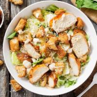 Grilled Chicken Salad · Grilled chicken tossed with mixed greens, boiled eggs, fresh tomato, toasted almonds, and ba...