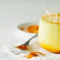 Anti-Inflammatory Juice · Turmeric and ginger juice with carrot, pineapple, banana, and almond milk.
