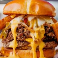 Cheesesteak Wit Wiz Smash · 2 LODED N smashed steak burgers, shaved sirloin steak, peppers & onions, cheese wiz sauce, f...