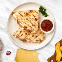 Cheese Chaser Quesadilla · Four cheeses wrapped in a grilled tortilla with pica de gallo.