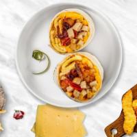 Sausage In Rage Breakfast Burrito · Eggs,Pork Sausage,Pico de galo & Mix Cheese on Whole wheat wrap