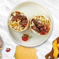 Pastrami Perfect Burrito · Pastrami topped with sour cream, salsa, cheese, and spanish rice wrapped in a warm tortilla ...