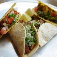 Tacos (3) · Soft or Hard style, our savory Tacos will have you wanting more. 3 in an order.