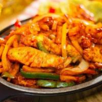 Pollo Salteado  (Chicken & Vegetables Sautéed Mix ) · Mixed with bell peppers and french fries sauteed in sweet tomato sauce.