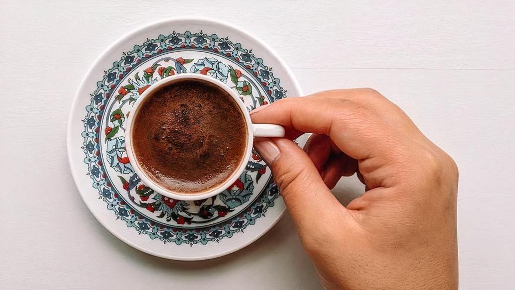 Turkish Coffee - Double · Turkish coffee prepared traditionally in a sandpit, served with the grounds in the cup