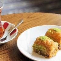 Baklava · Traditional Turkish pastry made from phyllo dough, finely crushed pistachios, butter, and su...