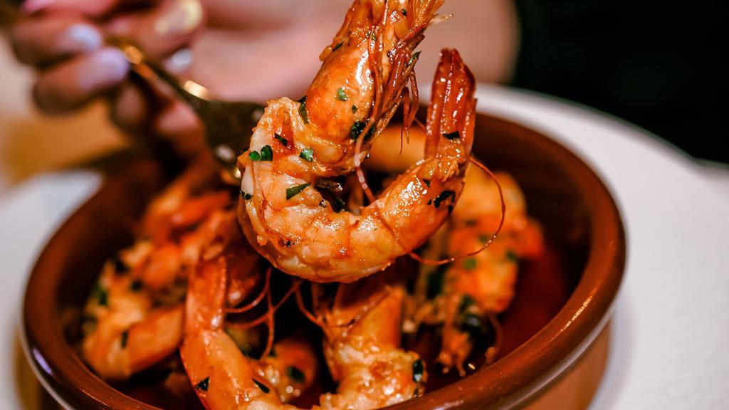 Pan Seared  Prawns · shrimp, chili, garlic, pimenton, baguette