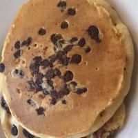 Chocolate Chip Banana Pancakes · Our famous pancakes loaded with bananas & Chocolate chips.