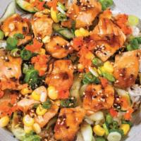 Ray Loves Grilled Salmon · Grilled Salmon, cucumber, Korean BBQ sauce, corn, scallion, pickled radishes and ginger, ses...