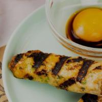 Chicken Skewer · shoyu, poached egg yolk