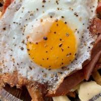 Jersey · Classic poutine with pork roll and sunny side egg.