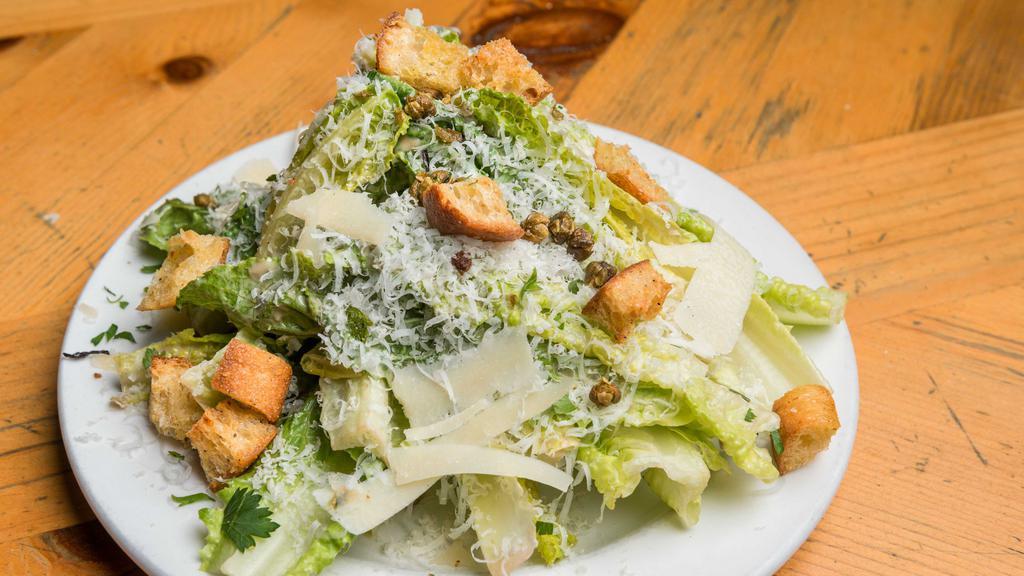Caesar Salad · Fried capers, garlic croutons.
