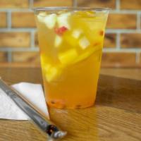 Ice Fruit Tea · Jasmine Tea with fresh apple, pineapple , lemon and passion fruit.