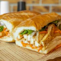 Lemongrass Chicken Banh Mi · Grilled lemongrass chicken, pickled carrot and daikon, cilantro, jalapeños and spicy mayo on...