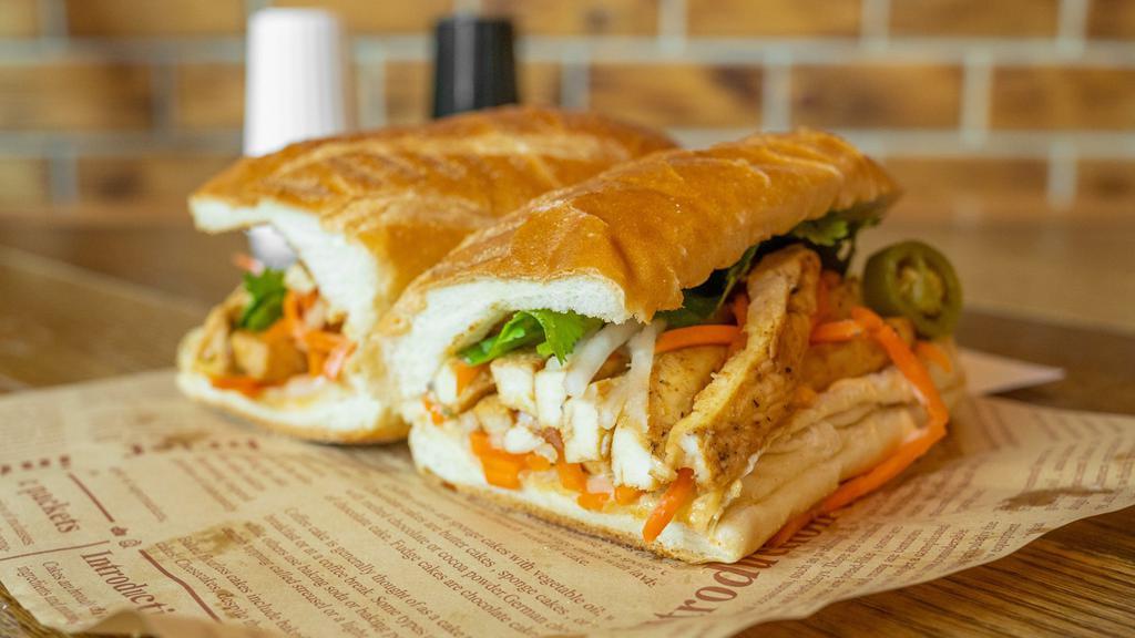 Lemongrass Chicken Banh Mi · Grilled lemongrass chicken, pickled carrot and daikon, cilantro, jalapeños and spicy mayo on toasted hero.
