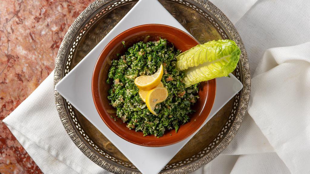Taboulah · Vegan. Authentic parsley salad with bulgur, mixed with chopped scallions, tomato , mint, oiive oil and fresh lemon juice.