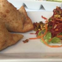 Vegetable Samosa · Contains gluten. Pastry turnovers stuffed with spiced potatoes and green peas. An all-time f...