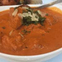 Chicken Tikka Masala · An all-time favorite from Punjab. Breast of chicken broiled in tandoor oven and cooked in a ...