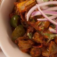 Bhindi Do Pyaza · Vegan. Fresh okra cooked with onions, ginger, tomatoes, herbs and spices. Northwestern speci...