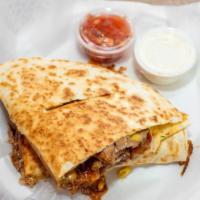 Pulled Pork Quesadilla  · Pork, cheese, corn, crispy onion and BBQ sauce.  Sour cream on the side.