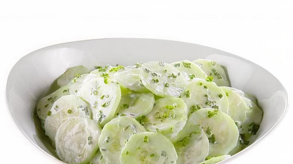 Bosnian Cucumber Salad · Homemade yogurt sauce, fresh cucumbers with dill, olive oil and hint of fresh garlic.