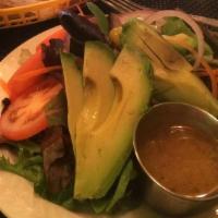 Avocado Salad · Mixed greens, avocado, baby tomatoes, onions, carrots and Italian dressing.