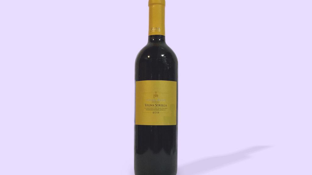 Atha Ruja Vigna Sorella Cannonau Di Sardegna 2018 · Its color is a deep ruby red and it is truly a wine of great complexity and typicality. Opens with aromas of red berries, herbs, licorice and spices. Its rich structure is well balanced by its elegant tannic complexity and fulfilling persistence.