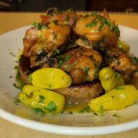 Papa G'S Chicken Scarpariello · Bone in dark meat chicken pieces with sweet or hot sausage and pepperoncini’s.