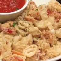 Fried Calamari · Comes with red sauce.