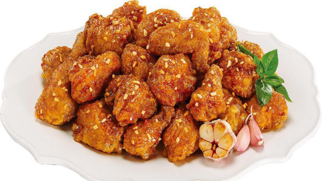 Soy Garlic Wings · Battered and fried - brushed with garlic infused soy sauce with a hint of spice at the end