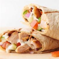 Chicken Shawarma · A tender cut of chicken marinated in our Middle Eastern spices with a hint of curry, roasted...