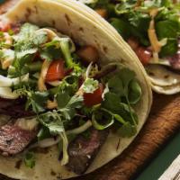 Steak Quesadilla · Flour tortilla filled with grilled skirt steak and jack cheese. Serve with salsa and sour cr...