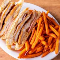 Blue Sandwich Deluxe · Fried chicken with ham, Swiss cheese and honey dijon. Served on ciabatta bread with sweet po...