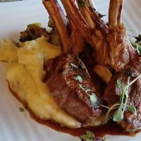 Lamb Chop Entrée · Grilled lamb chops served with two sides, served with a beef demi-glace.