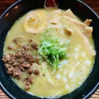 Zurutto Curry · Chicken curry broth, ground pork, seasoned boiled egg, bamboo shoot, onion, and scallion.
