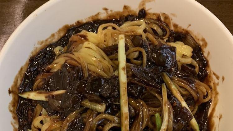 Jja Jang Myun / 짜장면 / 炸醬麵 · Brown pork sauce with noodle.