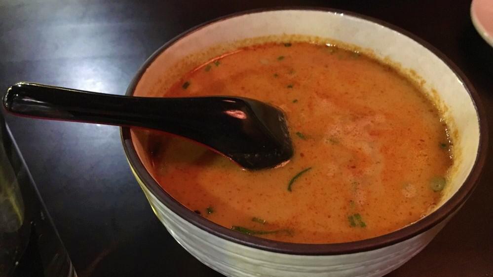Tom Yum Soup · Thai famous hot and sour soup broth with shrimp and lemongrass.