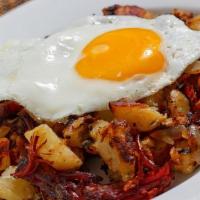 Corn Beef Hash And Eggs · Includes toast and potatoes.