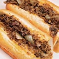 Philly Cheesesteak Sandwich · Steak, onions, peppers and American cheese.