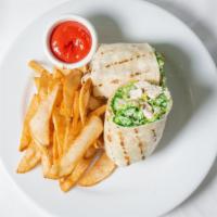 Grilled Chicken Caesar Wrap · grilled chicken breast, house made caesar, shaved parmesan & fresh romaine. Served with hous...