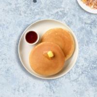 Egged Pancakes · Fluffy pancakes served with a side of eggs.