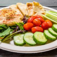 Hummus Platter · Garlic or roasted red pepper hummus served with fresh veggies and pita bread.