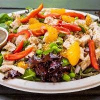 Mandarin Salad · Greens topped with tomatoes, red onion, roasted bell peppers, mandarins, edamame, and sesame...
