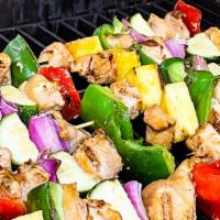Grilled Chicken Kabobs · Two chicken kabobs. Zucchini, pineapple, onion, bell peppers, mushrooms, and tomato. Served ...
