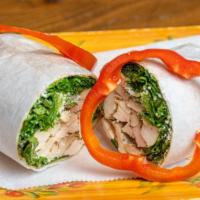 Chicken Caesar Wrap · Grilled chicken, romaine lettuce and parmesan cheese in a whole wheat wrap with creamy Caesa...