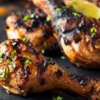 Jerk Chicken · Served with one side and salad-
Please state the side that you are requesting
