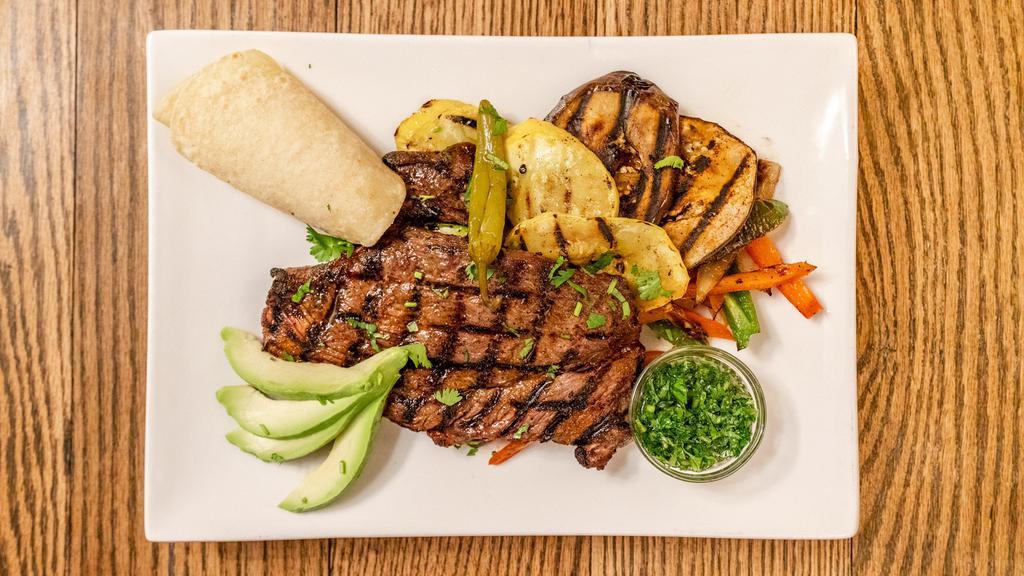 Carne Asada Fajitas · Grilled 9-ounce new york strip, pico de gallo, black bean sofrito, queso fresco, and corn tortilla.