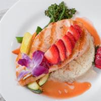 Salmon Berry · Broiled salmon topped with hot and spicy jack daniels strawberry glaze, served over coconut ...