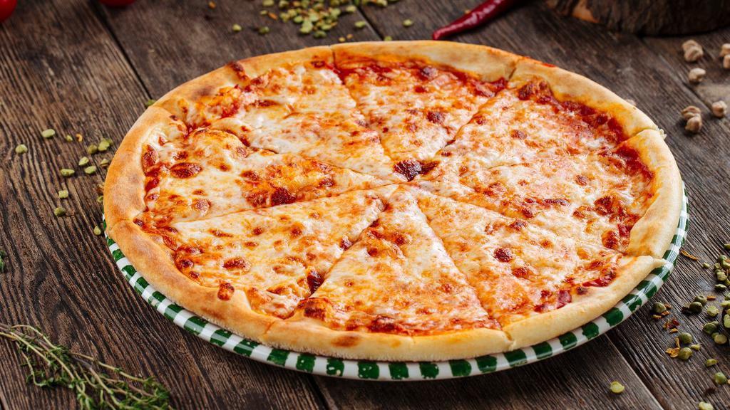 Margherita Pizza · Tomato slices, fresh basil, and mozzarella cheese on a fresh baked pizza.