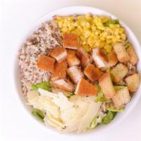 My Kale Caesar Bowl · Served with baby kale, baked chicken cutlet, caesar dressing, corn, croutons, organic brown ...